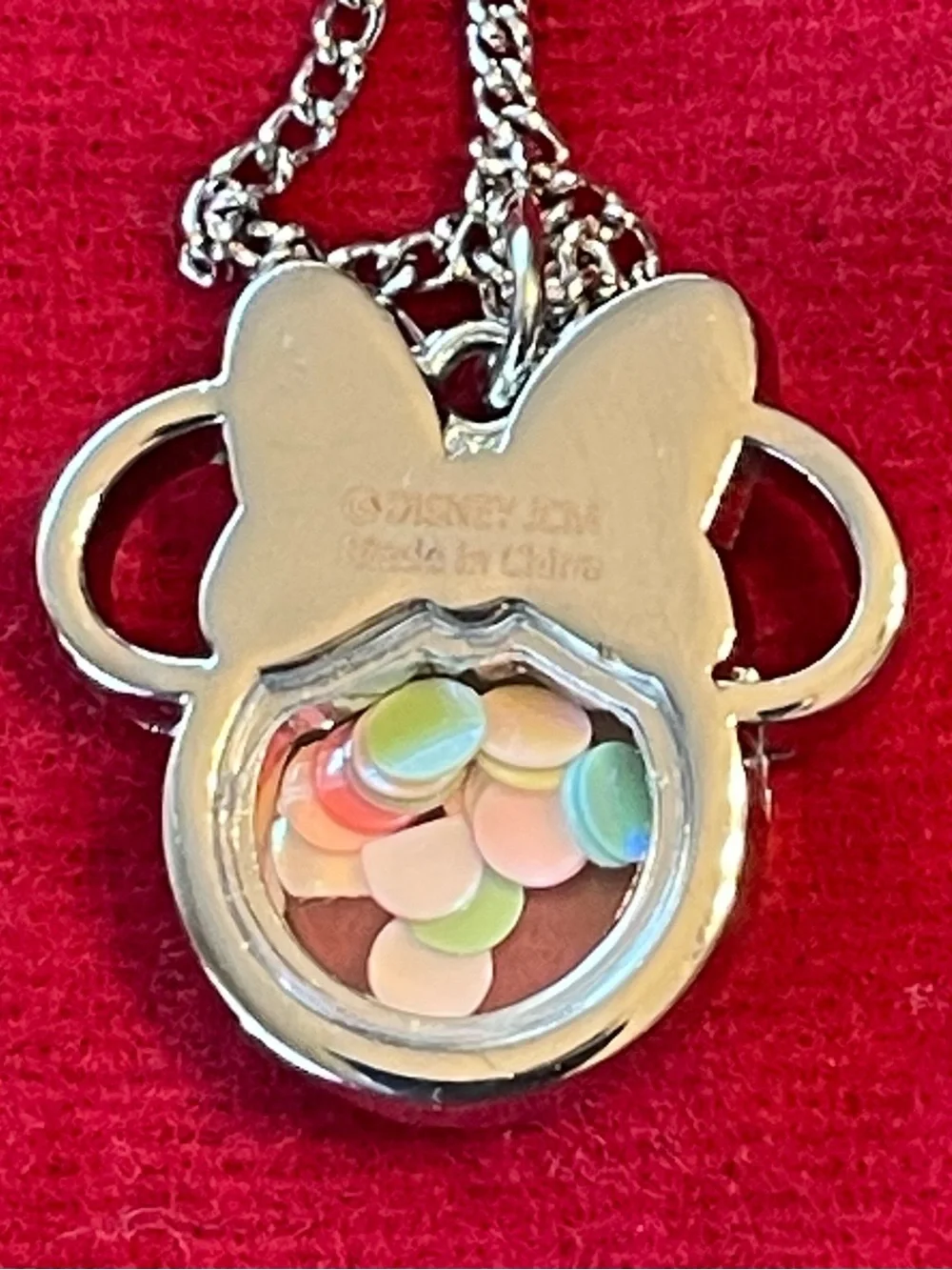 Minnie Mouse shaker charm on silver chain.